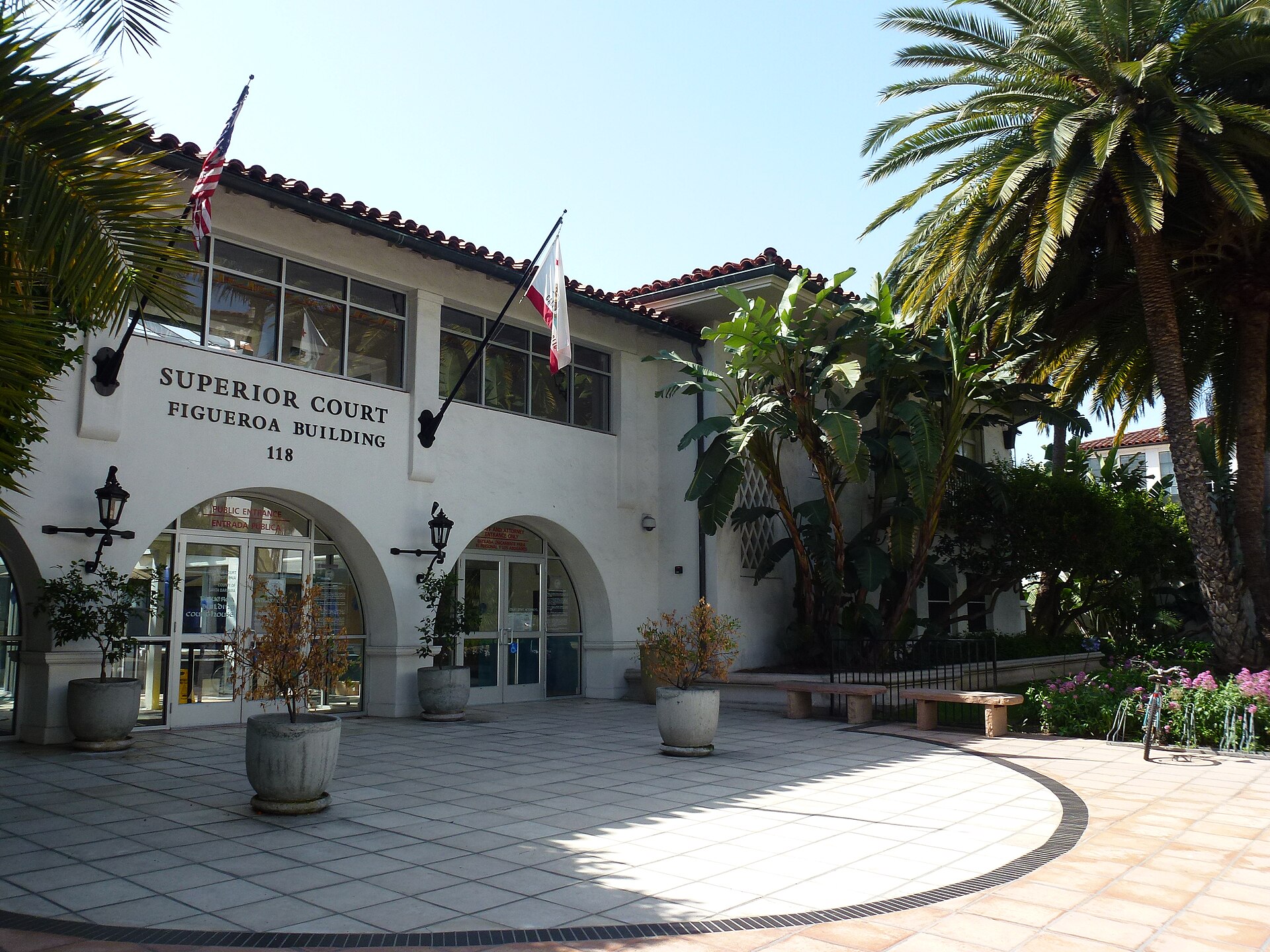 Santa Barbara County Courthouse with palm trees and red tile roof